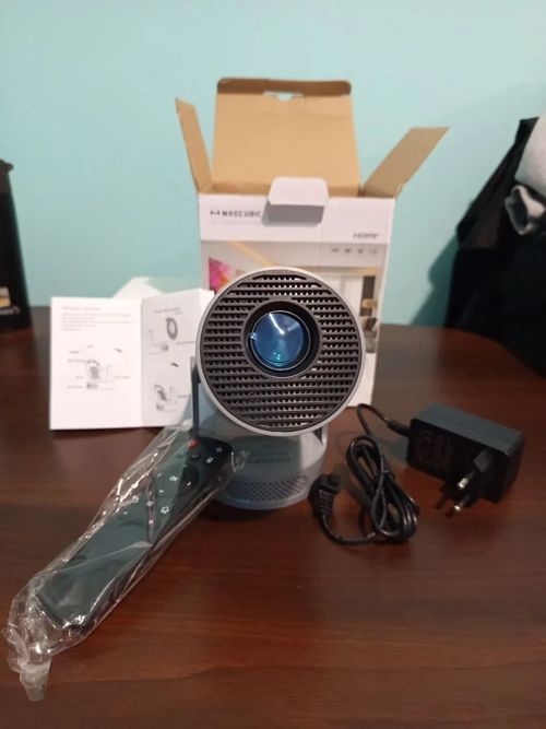 unpacking mini projector that comes with remote 